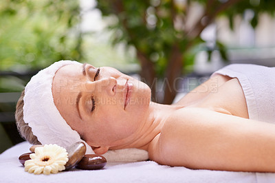 Buy stock photo Happy woman, sleeping and relaxation with zen for skincare, stress relief or peace at spa, hotel or resort. Calm female person asleep in relax for facial, beauty or body treatment at outdoor salon