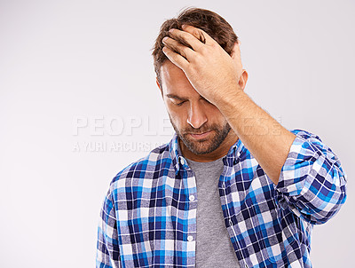 Buy stock photo Man, hand and headache pain with fatigue stress on white background for migraine, burnout or mockup space. Male person, anxiety and brain fog tension in studio with vertigo health, wellness or dizzy