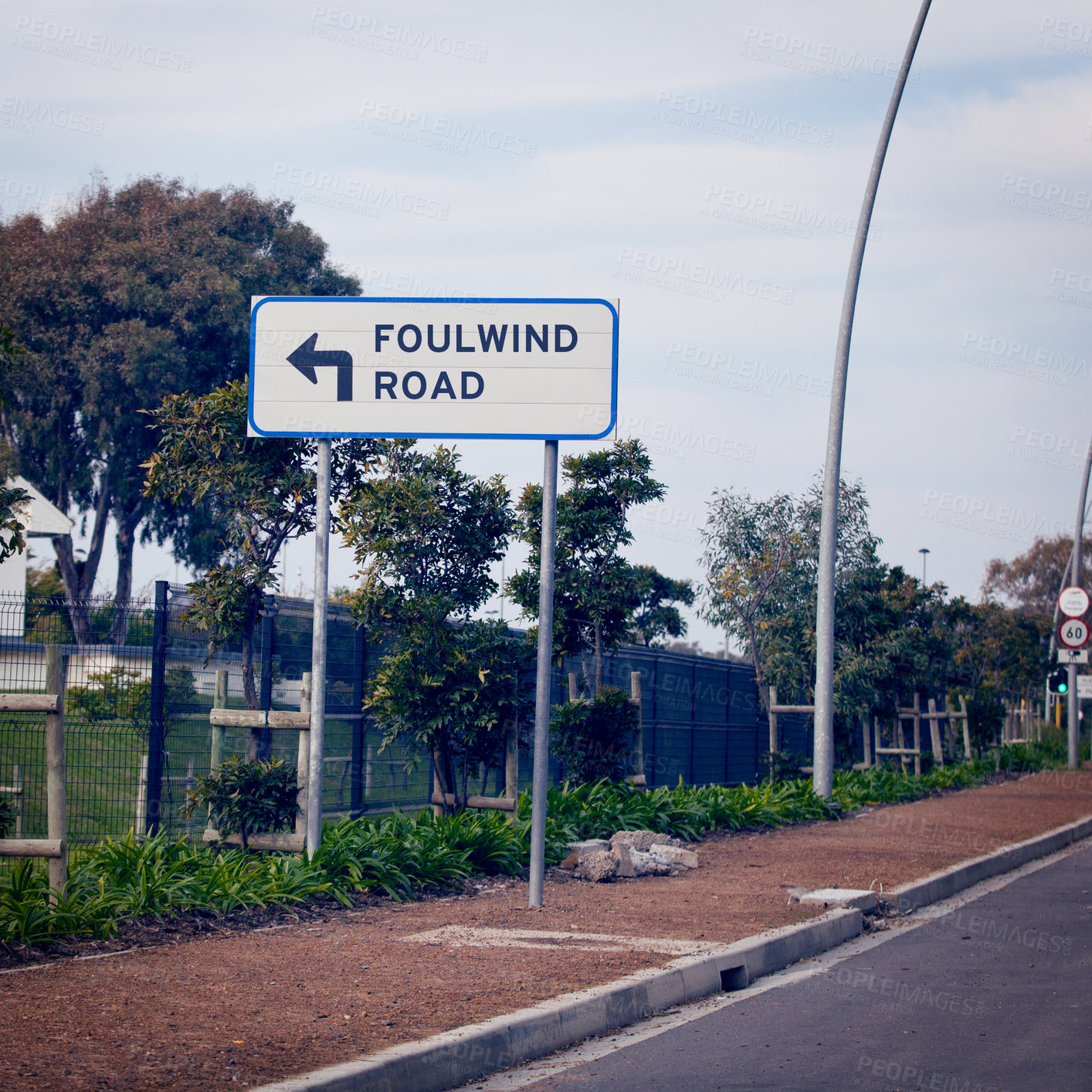 Buy stock photo Signage for wind, road and city with information, outdoor and nature with urban town and design. Direction, icon and street with symbol and trees with poster and language with bushes and board