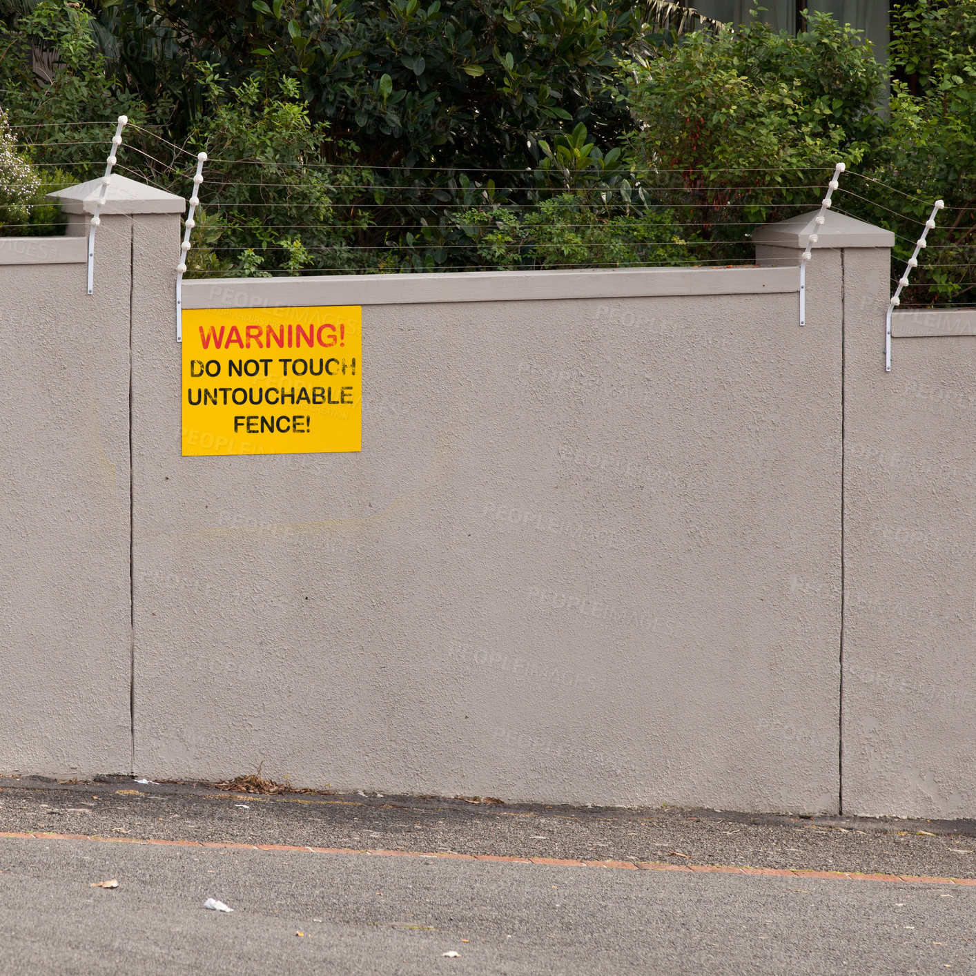 Buy stock photo Electrical fence, warning and sign on wall of property for caution, notification and information. Public signage, symbol and building with board, poster and for attention, message and safety message