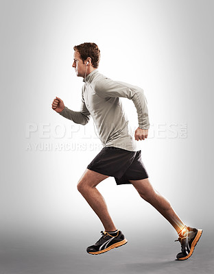 Buy stock photo Man running, fitness and ankle pain with overlay, exercise injury and medical emergency on studio background. X ray, anatomy and skeleton with male runner with injured foot, inflammation and sprain