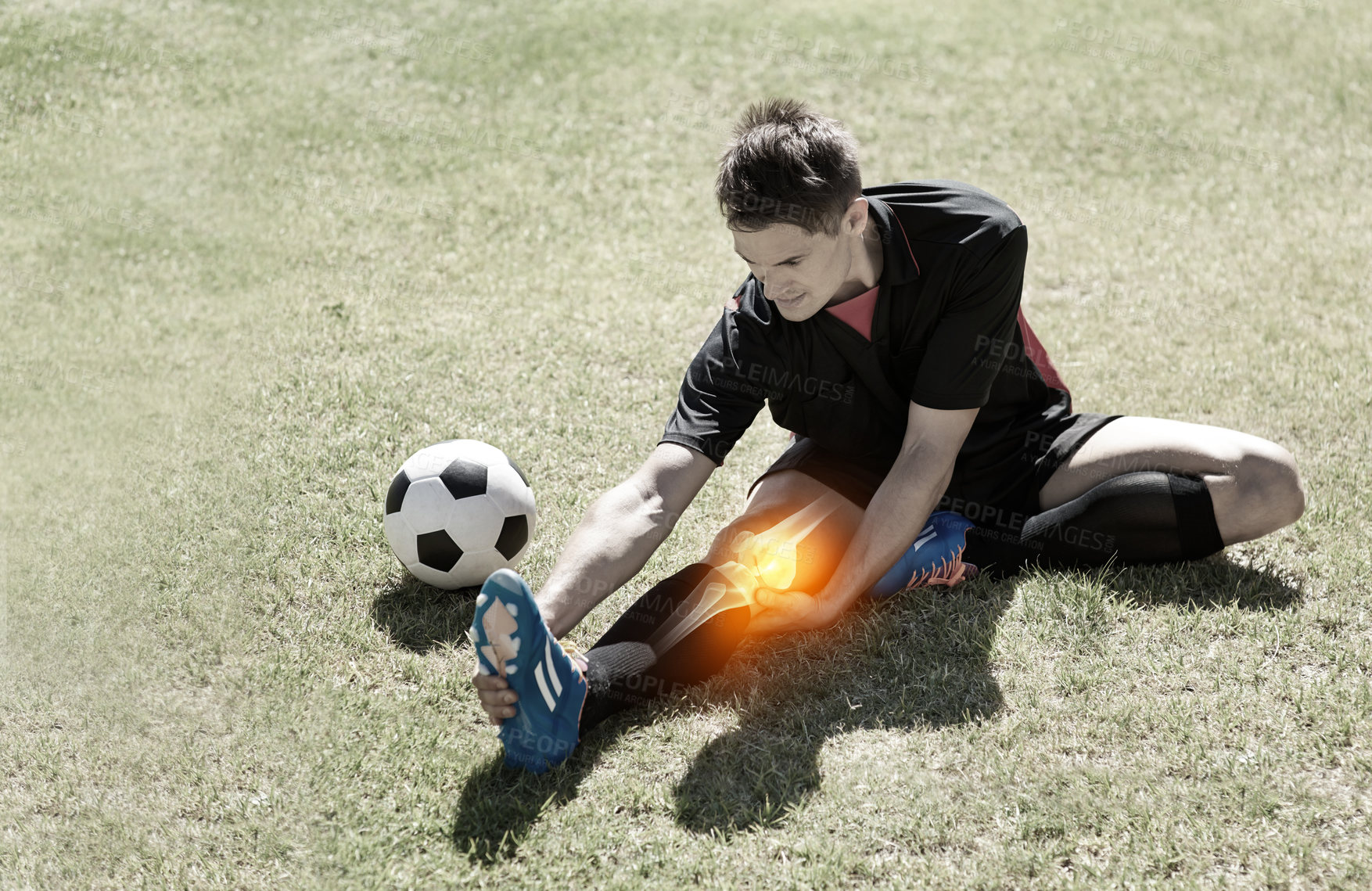 Buy stock photo Cropped shot highlighting a sportsperson's injury