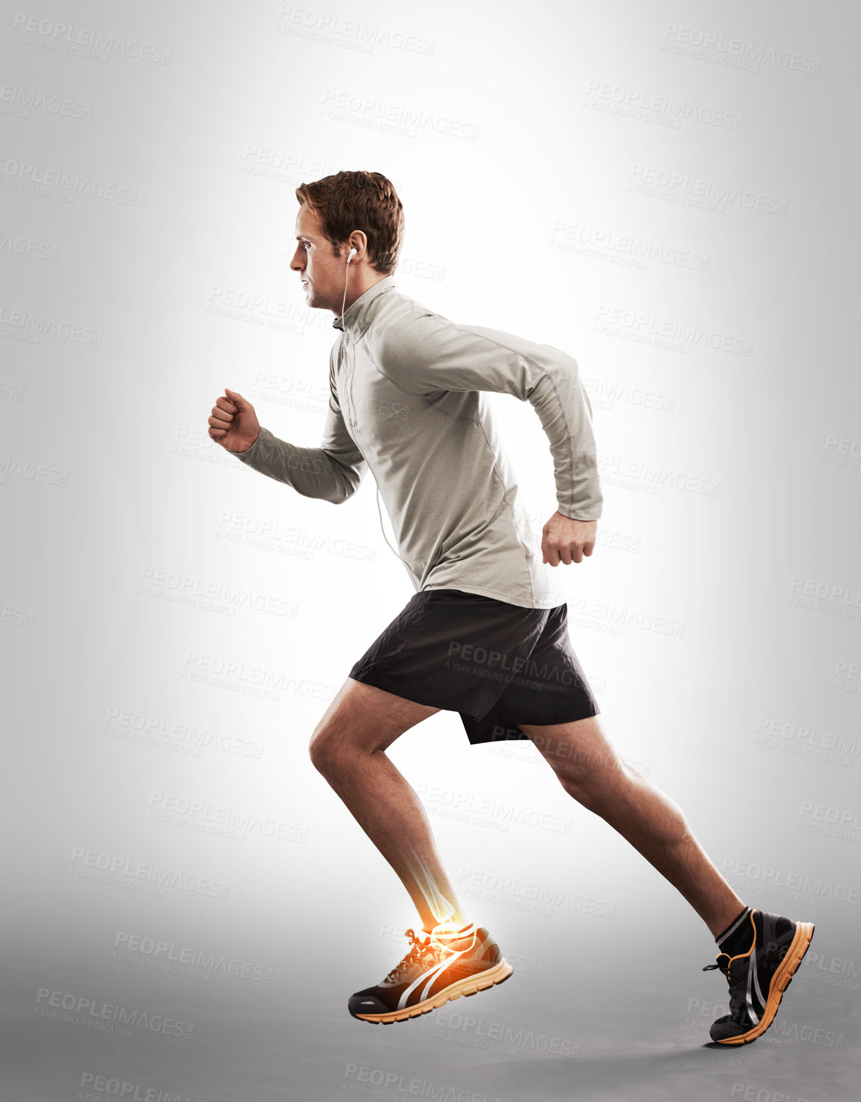 Buy stock photo Man running, exercise and ankle pain with overlay, fitness injury and medical emergency on studio background. X ray, anatomy and skeleton with male runner with injured foot, inflammation and sprain