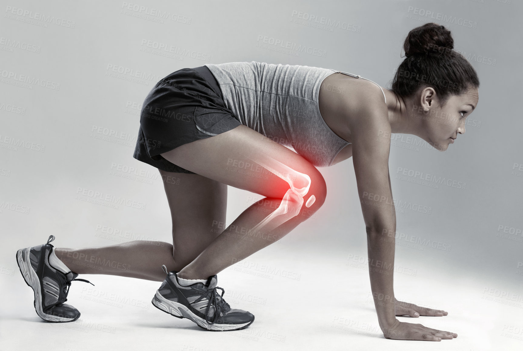 Buy stock photo Woman, running and start with knee x ray for injury, workout or sport accident against a gray studio background. Female runner in skeleton pain with sore leg, ache or bone from exercising or training