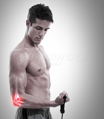 Buy stock photo Man, elbow and x ray in weightlifting injury, workout or exercise against a gray studio background. Muscular male lifting weight with sore arm, ache or pain from sports accident on mockup space