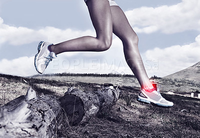 Buy stock photo A cropped view of a female runner's legs with an injury