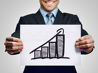 Buy stock photo Cropped shot of a businessman holding up a hand-drawn profit graph