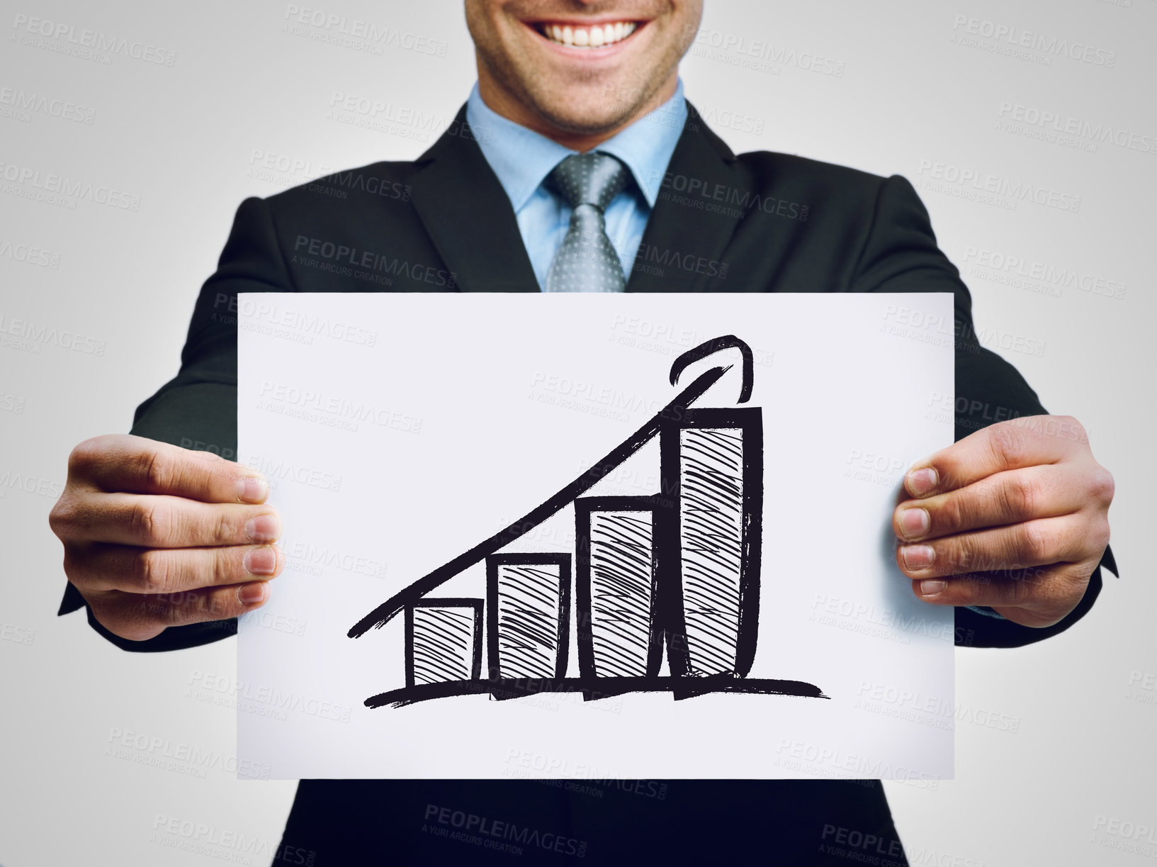 Buy stock photo Cropped shot of a businessman holding up a hand-drawn profit graph