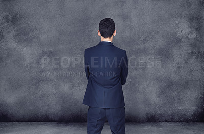 Buy stock photo Businessman, thinking and decision with choice for ideas, selection or pick on a gray studio background. Rear view of man or employee in wonder, thought or choose for career ambition on mockup space