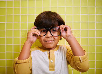 Buy stock photo Child, portrait and glasses with smile and bathroom with vision in a home. Happy, eyewear and youth fashion with an Indian boy with modern and casual style in a house with confidence and frames