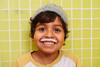Buy stock photo Milk moustache, smile or boy portrait in house with healthy breakfast drink on yellow wall background. Protein, dairy and face of kid in india with milkshake for balance, energy or calcium nutrition