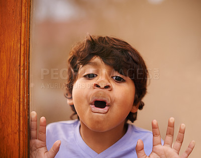 Buy stock photo Window, face and funny kid with nose press comic in his house with silly, joke or goofy gesture. Glass, mouth or Indian boy child with humor, games or playing on vacation, holiday or weekend in India