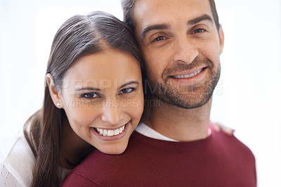 Buy stock photo Portrait, hug and happy couple in a house with love, trust and security, support or bonding at home. Marriage, commitment or face of people in embrace in comfort, safety or gratitude in an apartment