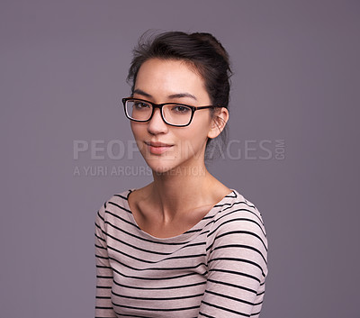 Buy stock photo Portrait, fashion glasses and serious woman in studio isolated on a gray background mockup space. Face, nerd and female geek, person or model from Canada with trendy clothes, eyewear and casual style