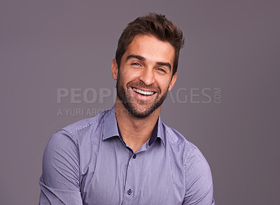 Buy stock photo Studio shot of a handsome man against a gray background
