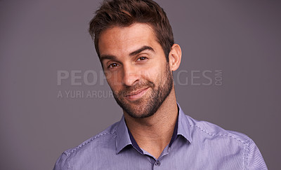 Buy stock photo Studio shot of a handsome man against a gray background