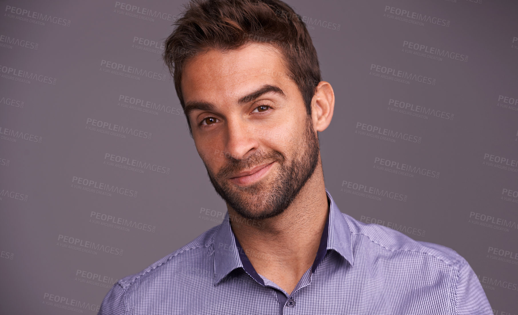 Buy stock photo Studio shot of a handsome man against a gray background