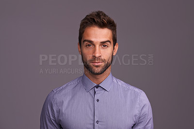 Buy stock photo Serious, professional and portrait of business man in studio with company pride, confidence and style. Creative startup, agency and face of isolated person for career, work and job on gray background