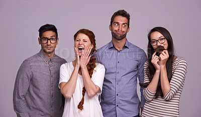 Buy stock photo Happy people, friends and portrait with funny faces in fashion for comedy or humor on a gray studio background. Silly group or goofy community laughing for fun joke, meme or friendship in happiness