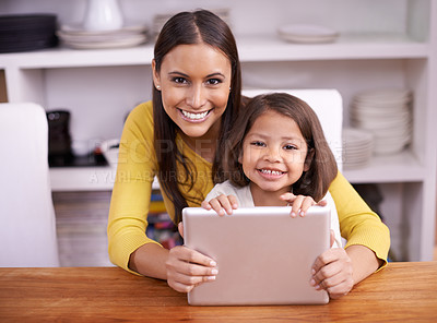 Buy stock photo Portrait, home and mother with girl, tablet and bonding together with a smile and connection. Face, family and mama with daughter and relax with technology and internet with social media and website