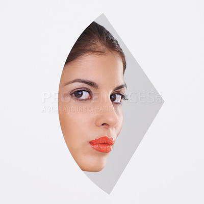 Buy stock photo Young woman, portrait and makeup in a cutout and studio for cosmetics, skincare and dermatology. Face of model in beauty and foundation with geometric closeup and creative shape on a white background