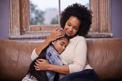 Buy stock photo Mother, child and hug on sofa with love for bonding connection with security, support or trust. Woman, daughter and embrace on couch for comfort parenting in home living room, happiness or weekend