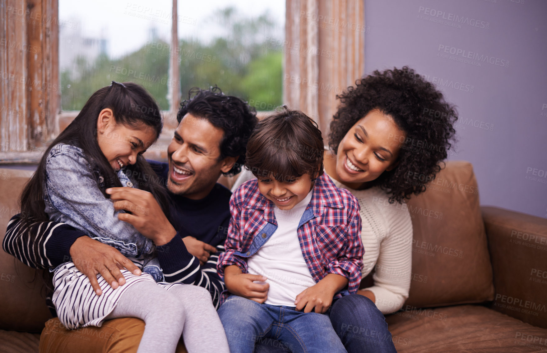 Buy stock photo Parents, children and laughing on couch for playing connection for relax holiday, love or bonding. Man, woman and siblings for childhood trust for parenting support or comfort care, joke or happiness