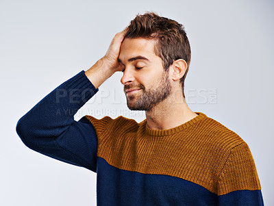 Buy stock photo Happy man, mistake and regret with anxiety, failure or embarrassed on a white studio background. Male person or model in disappointment, emotion or ashamed reaction for decision or choice on mockup