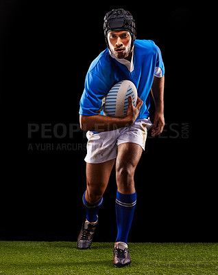 Buy stock photo Shot of a young rugby player on the field
