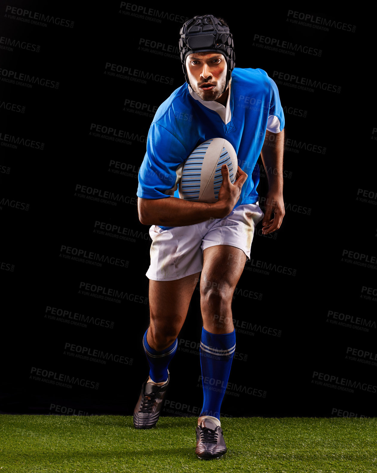 Buy stock photo Shot of a young rugby player on the field