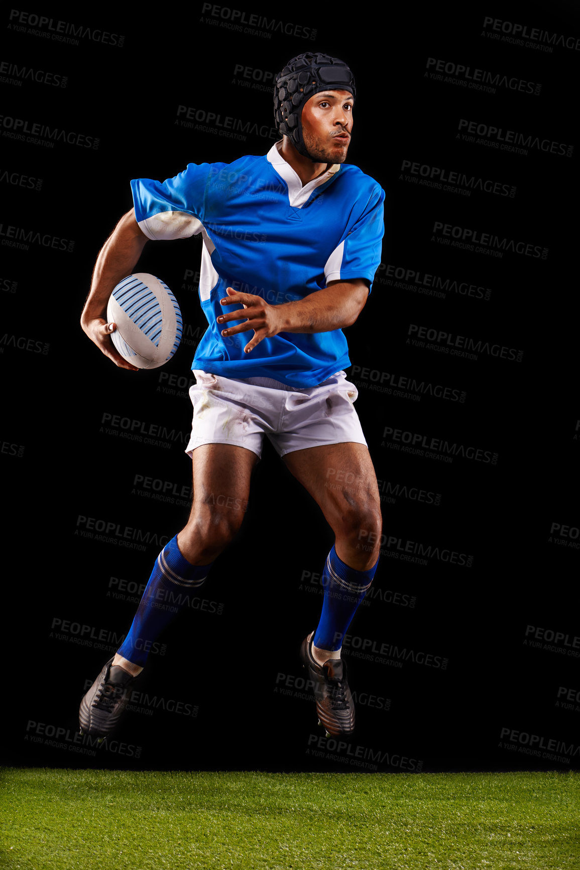 Buy stock photo Jump, man and ball for rugby sport or training for workout, fitness and skill for competition. Person or player on grass and athlete practice or active for football game or match on black background.