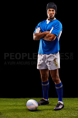 Buy stock photo Rugby, portrait and man in studio with arms crossed for training, competition and sportswear in black background. Night, ball and young male athlete for confidence for professional sport or workout