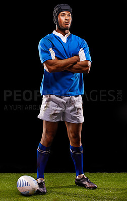 Buy stock photo Confident, man and black background for rugby sport or training for workout, fitness and skill for competition. Serious player on grass and professional athlete or tough with pride for football game.