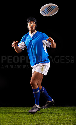 Buy stock photo Man, ball and rugby for sport and active for game, fitness and sportswear on grass or field. Young person, athlete or player and practice in uniform for kick, competitive and fit on dark background