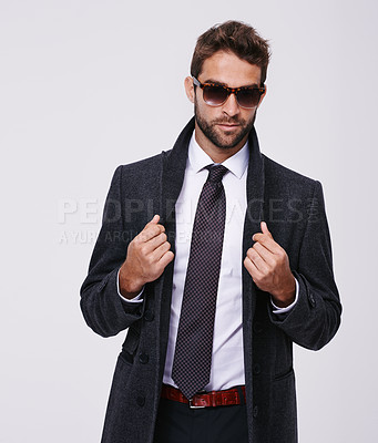 Buy stock photo Studio, fashion and man with professional coat, sunglasses or eyewear for aesthetic, portrait and confidence. Adult, male person and guy with grey background, stylish and employee for business