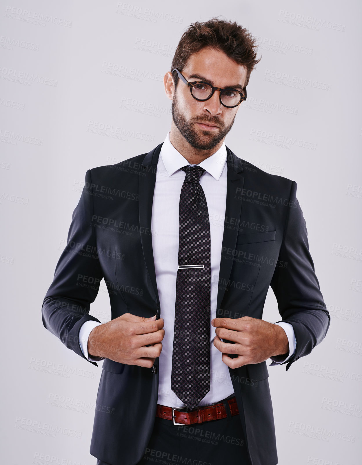 Buy stock photo Businessman, portrait and confidence in studio with professional suit for real estate job, sales or mockup space. Male person, face and glasses on white background for company, consultant or employee