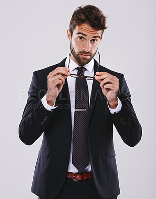 Buy stock photo Portrait, studio and businessman with suit, glasses for vision on lawyer or question expression and necktie. Corporate man person, professional with cool confidence, mockup and legal consultant