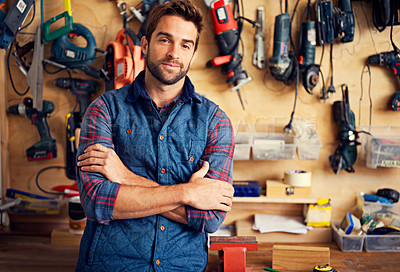 Buy stock photo Man, portrait and tools with arms crossed for home development, construction and renovation in workshop. Carpenter, male employee and contractor for maintenance, drill and repair work for diy