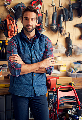 Buy stock photo Carpenter, tools and portrait of man with arms crossed for home development, maintenance and renovation in workshop. Confident, male person and contractor for construction, equipment and repair work