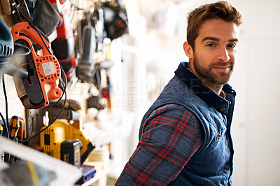 Buy stock photo Tools, carpenter and portrait of man in garage for manufacturing, production or small business. Male person, equipment and handyman with smile for renovation, maintenance or remodeling in workshop