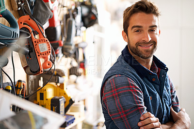Buy stock photo Smile, carpenter and portrait of man in garage for production, manufacturing or small business. Male person, tools and handyman with equipment for renovation, remodeling or maintenance in workshop