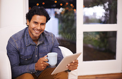 Buy stock photo Man, smile and portrait with tablet for internet, online and social media for streaming and relax in house. Arab person or blogger with tech and coffee for web on sofa in living room for break    