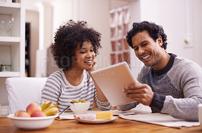 Buy stock photo Couple, tablet and kitchen with smile, social media and technology for online browsing. Man, woman and partner with love, romance and breakfast date for diet and healthy eating at home or house