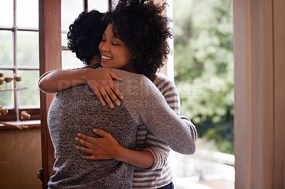 Buy stock photo Happy, couple and hug at door for welcome, greeting or meeting together for care in home. Woman, man and embrace at doorway with smile for visit, support or connection for love at reunion in house