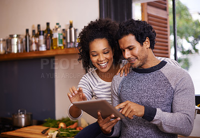 Buy stock photo Couple, tablet and cooking in kitchen with smile for online recipe, nutrition information and digital instructions. Man, woman and touchscreen in home for food website, bonding or happy for meal prep
