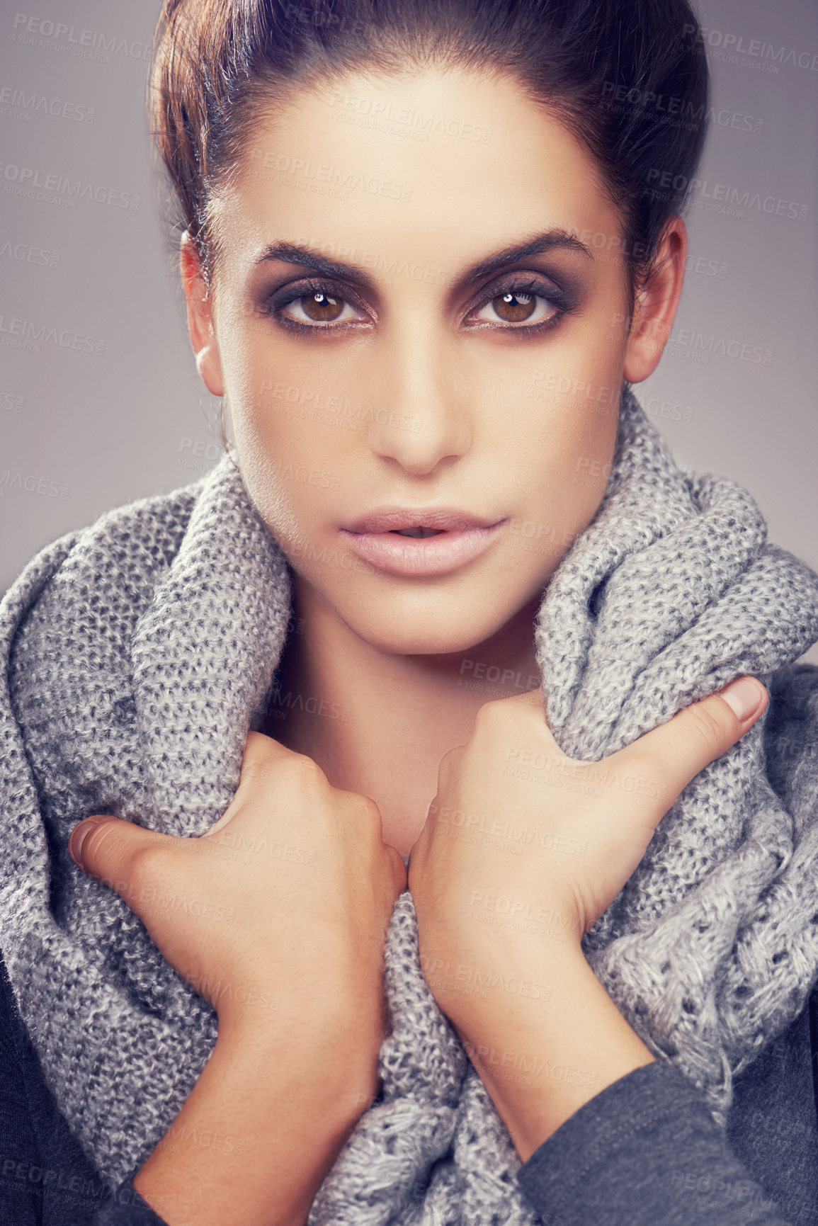 Buy stock photo Woman, fashion and portrait for trendy, cosmetic and style for aesthetic with scarf for winter clothes in studio. Model or young person and attractive with eyeshadow for smokey and bold for chic  