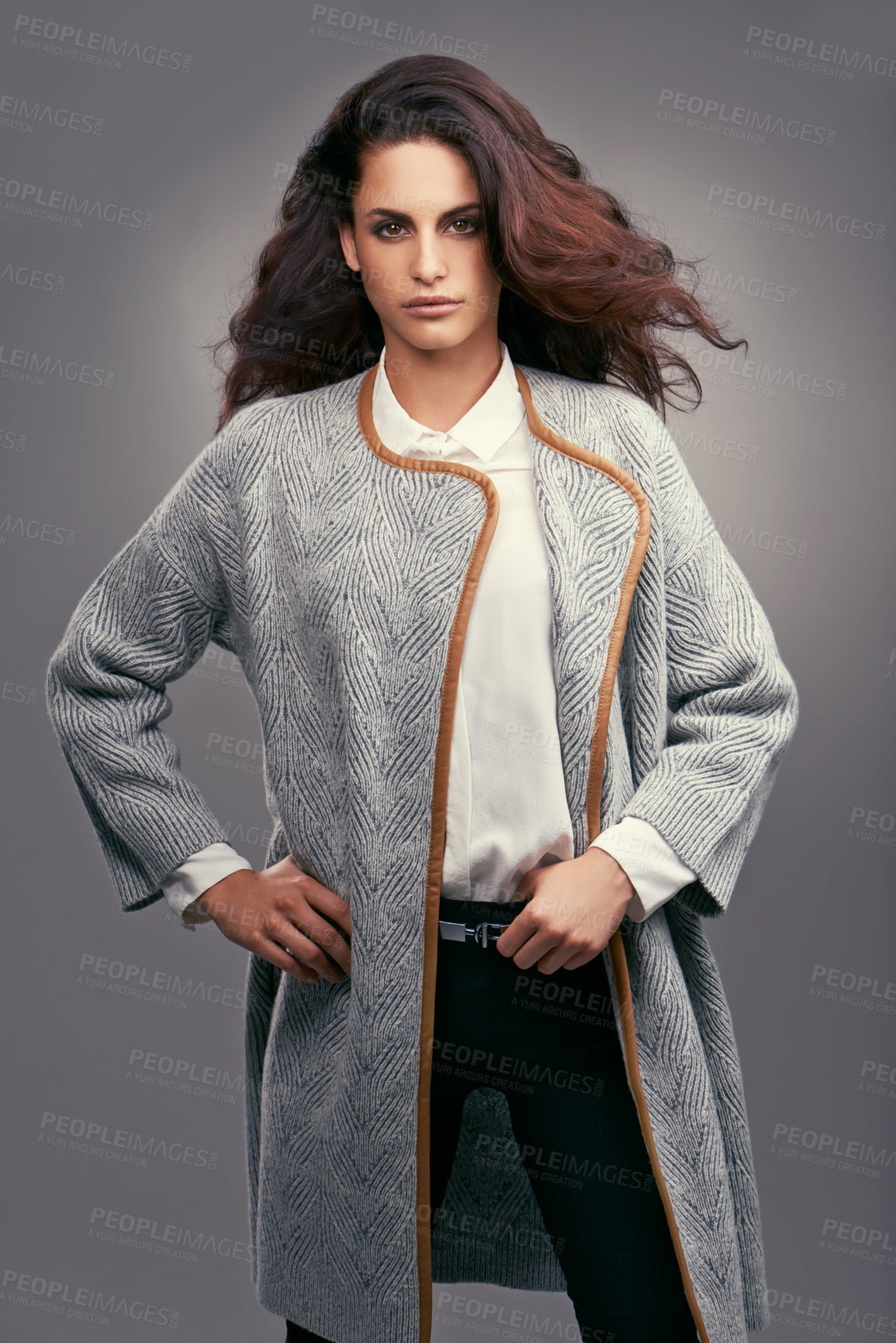 Buy stock photo Woman, portrait and elegant fashion in studio with confidence, classy style and trendy aesthetic with coat. Model, person and face with attitude in stylish clothes and hairstyle on grey background