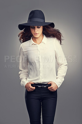 Buy stock photo Fashion, cosmetic and portrait of woman in studio with classy, trendy and stylish hat for outfit. Confident, makeup and female person with elegant style and accessory isolated by gray background.