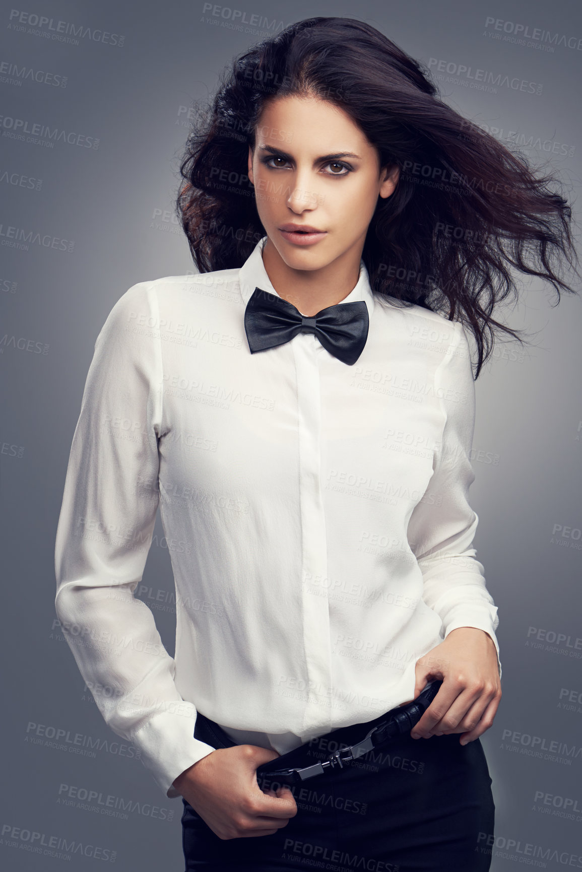 Buy stock photo Woman, bow tie or portrait of fashion model with vintage clothes or classy aesthetic in studio. Confidence, edgy lady or person with retro style, elegance and cool hair isolated on grey background 