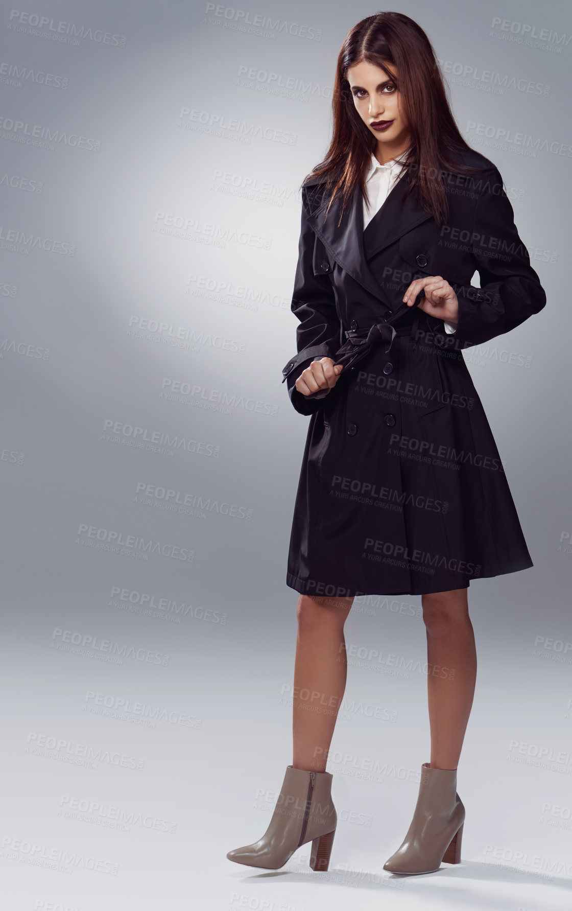 Buy stock photo Coat, fashion space or woman in portrait or studio for cool style, trendy jacket or comfortable outfit. Chic, mockup or confident model in cozy heels or elegant winter clothing on grey background